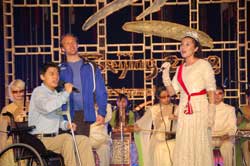 From the left: Thomas Stanghelle as Ketil Moe, Haitao as Mark Wang and Yi Daizao as HM Queen Sonja of Paralympics in Beijing 2008.